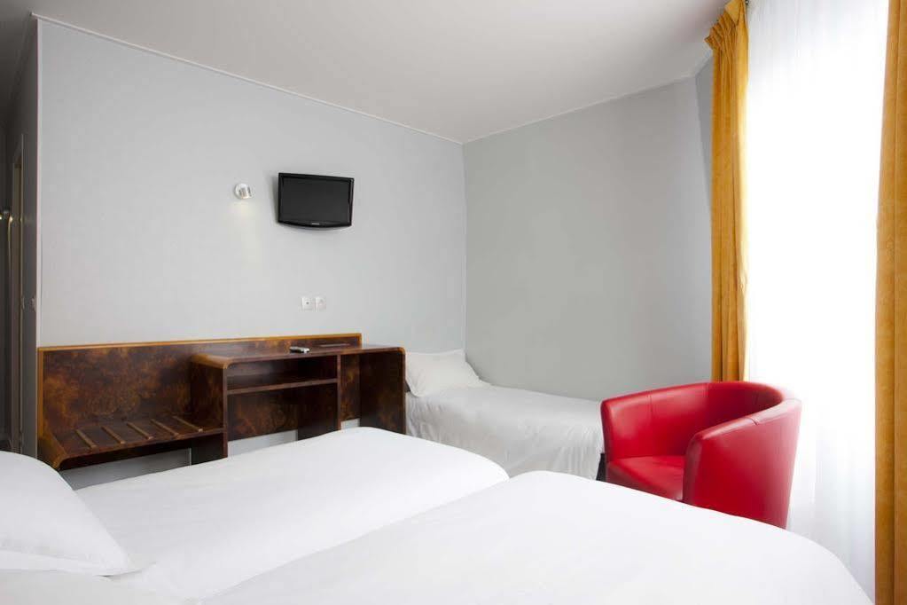 Hotel Moulin Vert Paris Exterior foto