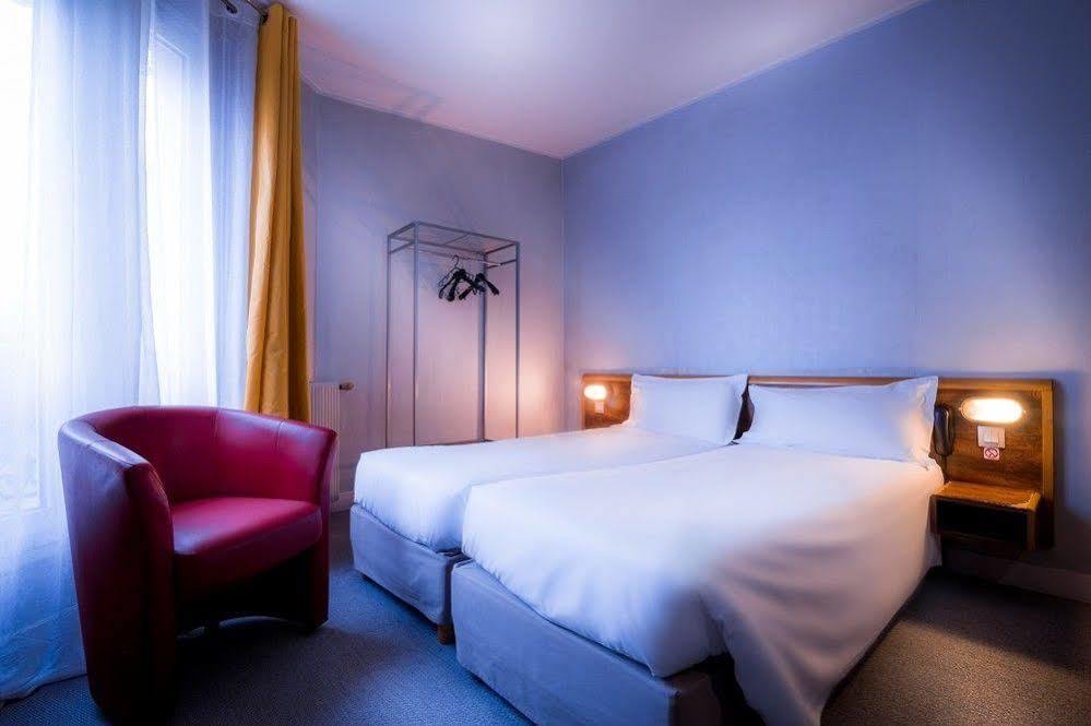 Hotel Moulin Vert Paris Exterior foto